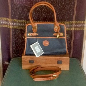 Dooney & Bourke  Leather Buckle Satchel. Navy